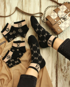 جوراب زنانه دخترانه طرحدار زمینه مشکی-97256