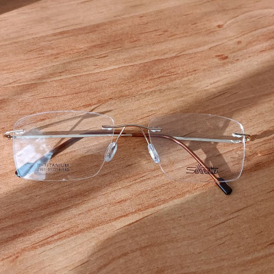 عینک طبی بی فریم طلایی